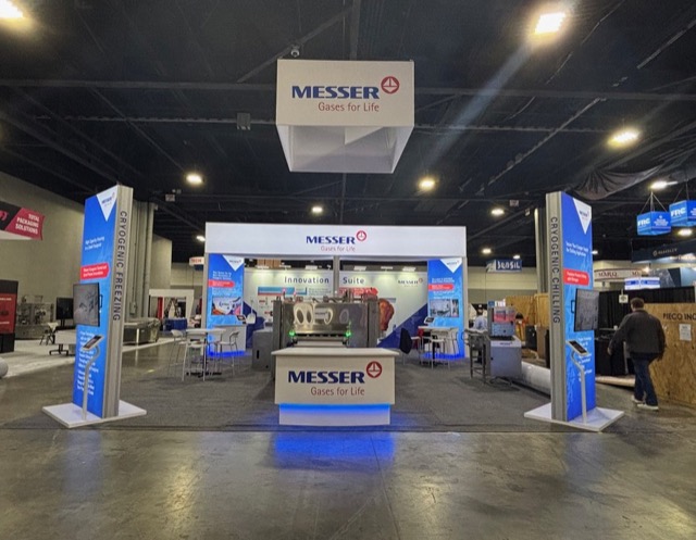Messer Gases for Life trade show booth with cryogenic freezing displays on a convention floor